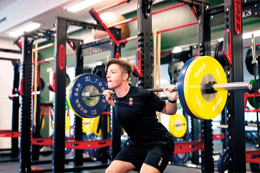 men's health: RGS Guildford pupil in the gym